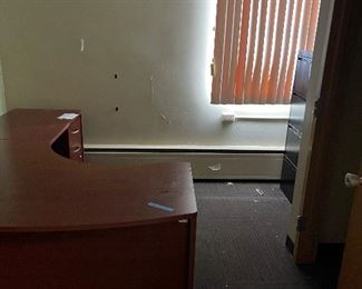 Multiple desks, some with Credenzas