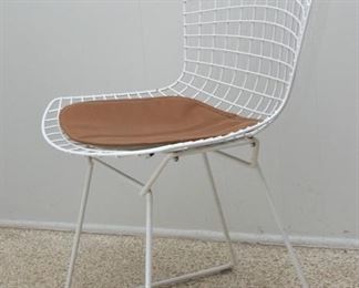 Bertoia side chairs (set of 4).  Coated iron w/vinyl seat cushions:  $200.00 (as is)