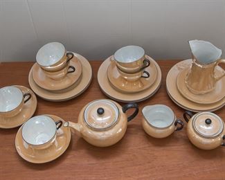 Luster Ware Victoria Czeche - Slovakia 15 pc. dish set.  6 - 8" dishes, 6 - cups and saucers, 1 - cream and sugar w/lids, 1 - tea pot w/lid:  $110.00.  Luster Ware Pitcher - Germany:  $30.00 (as is)
