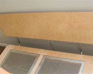 This platform bed frame will need to be disassembled before removing from the house.  Thank you.