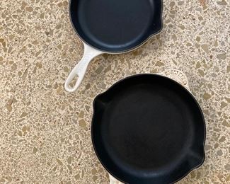 Top to bottom:  LeCreuset 9" enameled cast iron frying pan:  $180.00  LeCreuset 10" enameled cast iron frying pan:  $190.00