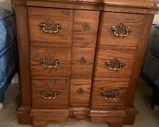 Nightstand pictured between the twin beds