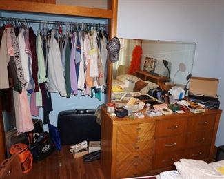 dresser with mirror, clothing, jewelry