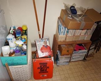 cleaning supplies, hamper, stadium seats, magazines