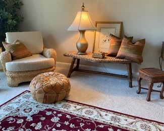 Wicker Chair, matching Wicker table, leather footstool, lamps, art