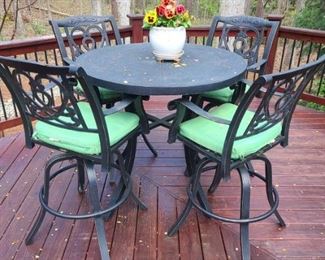 Castelle table top patio set with custom upholstery.