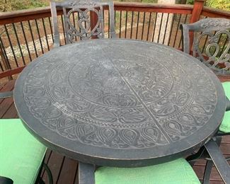 Castelle table top patio set with custom upholstery.