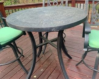 Castelle table top patio set with custom upholstery.