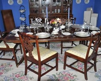Gorgeous Baker Mahogany Historic Charleston Dining Table with 2 Arm Chairs and 4 Side Chairs.The Dining Table is W44" x L66" with three 18" Extension Leaves