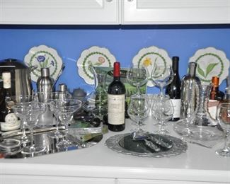 Great Selection of Bar-ware Including Martini Shakers, an Insulated Ice Bucket, Decanters, and Stemware. 