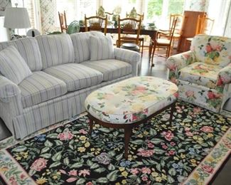 The Fantastic Sitting Area Showcases all Custom Upholstered Miles Talbott Furniture Including a Sofa, a Lounge Chair and an Ottoman as well as a Stark Needlepoint Area Rug.