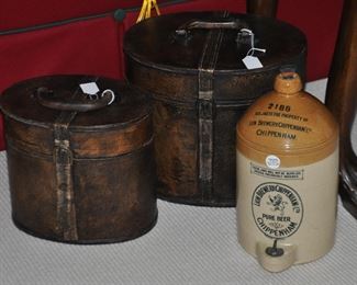 A Rare Antique Beer Dispenser by Lion Brewery/Chippenham Ltd.  Shown with a Pair of Distressed Brown Leather Round Decorative Boxes with Handles. The Larger Box is W13.5" x H11'5" x D10".  The Smaller Box is W11" x H10" x D8"