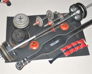 Weight Bars with Many Additional Weights Shown with a Valeo Belt