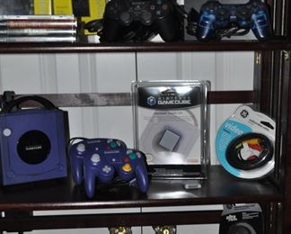 Vintage Gaming Systems Include Sony PS2 with Games and Controllers and Nintendo Gamecube Indigo with Controllers