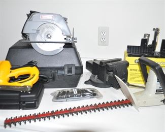 Selection of Power Tools including Craftsman 7.25 Circular Saw, Ryobi 22" Hedge Trimmer, Electric Stapler and Nail Gun by Arrow ETFX50.  Also shown is a Vise and Stanley Miter Box
