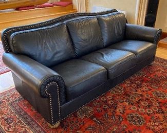 $580 Black leather nail head sofa with rolled arms.  Excellent condition. 78"l x 36"d x 36"h.