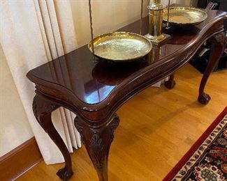 $420 Beautiful console table with carved legs and claw feet. 52"w x 18"d x 30"h.
