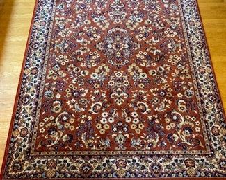 $290 Wool rug with navy/rust/cream colors. 8'9" x 5'2"