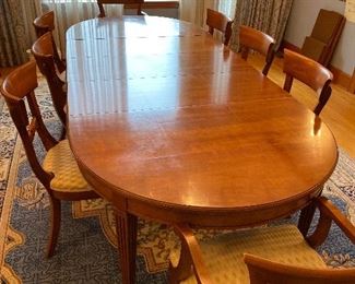 $640 Beautiful oval dining table with 8 chairs. 106" length with all 3 leaves.  58" length without leaves.  Includes 3 leaves that are 16"  Table is 43"w and 29.5"h