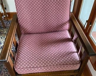 $220 Unique antique chair with cushions that converts to a day bed. 29"w x 28"d x40"h.  Approx. 72" when expanded.