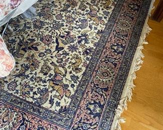 $300 Wool rug with blue, rose and beige pattern. 8' x 10'2".