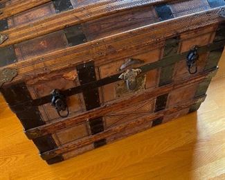 $280  Very unique antique steamer trunk. 30"w x 19"d x 24"h.  View of the trunk with the lid closed.