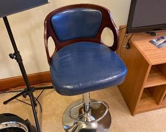 $60 Max Furniture swivel bar stool in blue.  26" seat height and 35" total height.