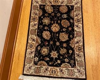 Small rug for sale in-person.