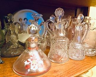 Antique crystal cruets.  Gorgeous.  Some are hand painted.
