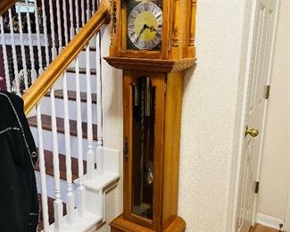 Petite. Hand Carved Grandmother Clock.  Beautiful Condition.  Small enough to fit into any home.