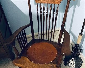 Gorgeous Oak Pressed Rocking Chair with Original Tooled Leather Seat.  Extremely comfortable and in perfect condition. 