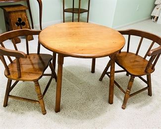 Antique child’s table and chairs. 1940’s. This belonged to the homeowner when she was a child.  It's in beautiful condition.  So cute.
