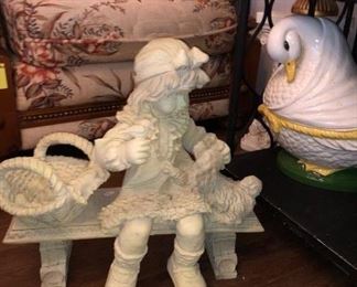 Little girl on a bench