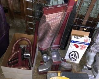 Two Kirby vacuums and lots of attachments!