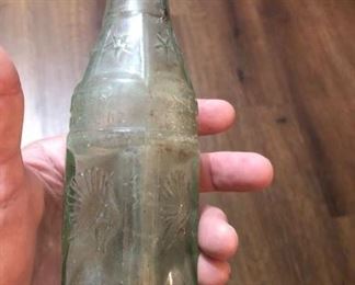 Has embossed turkeys - believed from Cuero Turkey Trot!