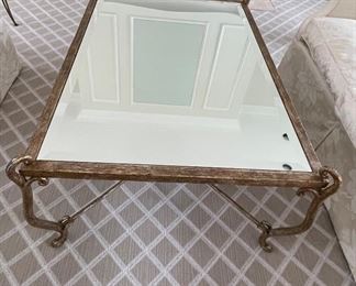 Mirror-Top Faux Bois Bronzed Metal Cocktail Table. Measures 45" W x 32" D x 19" H. Photo 1 of 5.