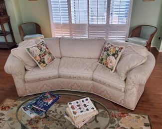 Cream curved sofa