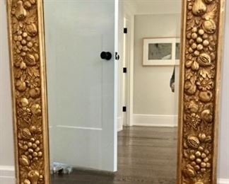 Large gilt mirror with beveled glass. 