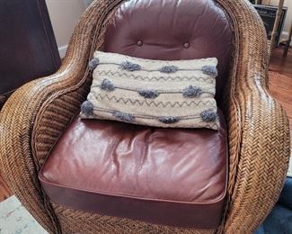 Rattan club barrel chairs with leather cushions, pair of two, finely woven rattan.  Beautifully worn leather cushions