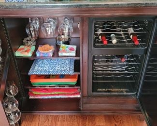 Tresanti Wine refrigerator and serving bar!  Refrigerator has two  temperature settings on right side and holds 24 bottles.  Left side also has bottle storage