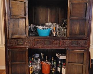 Interior of Asian cabinet used as a Bar and Storage
