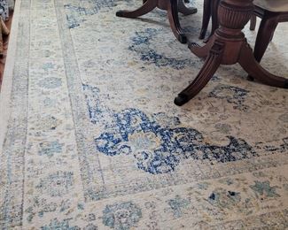 Safevieh Evoke 10' x 8' cream and blue rug in dining room (furniture not for sale)