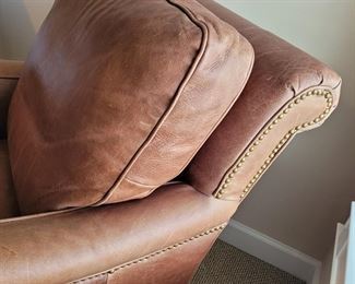 Nailhead detail on leather chair