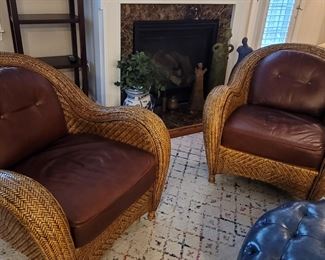 Rattan Club Barrel chairs with leather cushions, pair of two, finely woven rattan.  Beautifully worn leather cushions