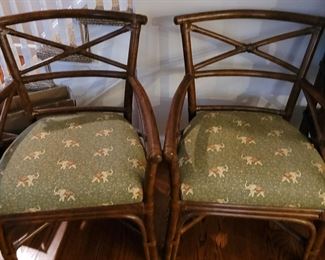 Four upholstered chairs with elephant print seats, fabric matches trim on pair of slipper-Parsons chairs