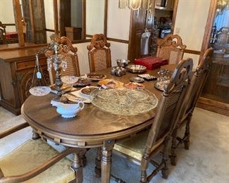 Dining Room Table, Chairs and table has leaf in but also has another leaf