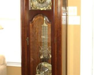 Sligh grandfather clock works well (a little damage lower corners)