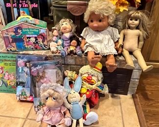A pile of cool and collectible dolls including a Wizard of Oz Dorothy and Glenda the good witch by Barbie