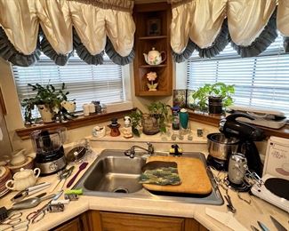 Kitchen supplies… mixer, utensils, etc