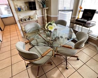 Real cool design vintage table & chairs! They roll and table is stunning… more pics later.